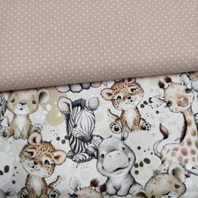 Tecido com padrão de animais bebés e tecido castanho claro com pontos brancos