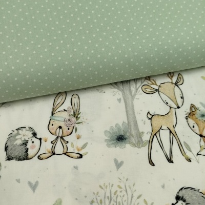 Tecidos com padrão de pontos brancos e animais da floresta