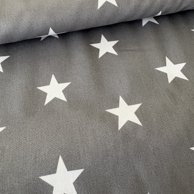 Tecido cinzento com estrelas brancas e textura macia
