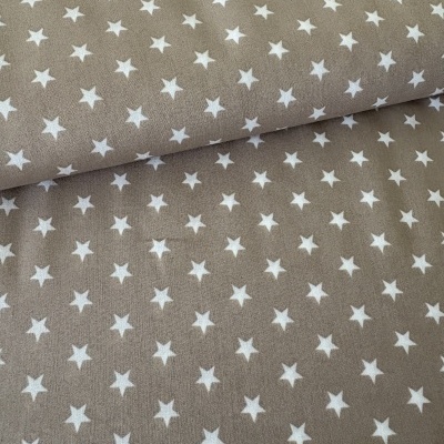 Tecido bege com estrelas brancas