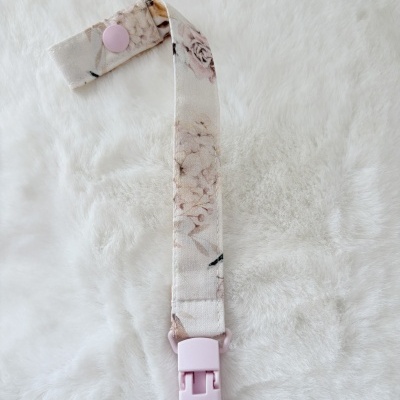 Prendedor para chupeta floral com clip rosa
