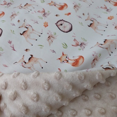 Manta infantil dupla face com padrões de animais e textura felpuda