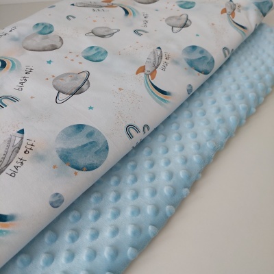 Tecidos com padrão de espaço e textura azul claro