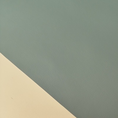 Texturas e cores de superfícies azul esverdeada e creme