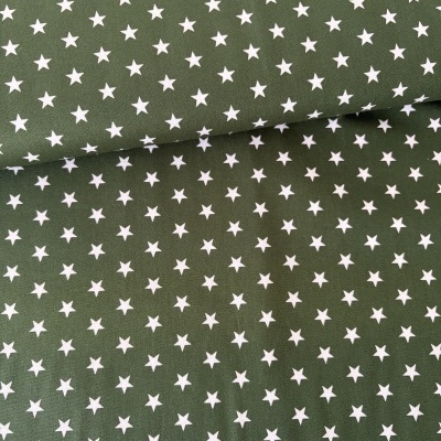 Tecido verde com estrelas brancas pequenas espalhadas uniformemente.