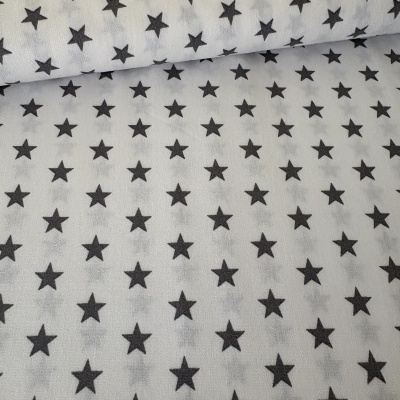 tecido cinzento claro com estrelas pretas