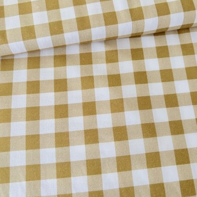 Tecido xadrez branco, bege e mostarda com padrão de quadrados.