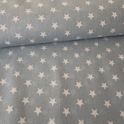 Tecido azul claro com estrelas brancas