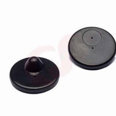 Dois dispositivos redondos pretos sobre fundo branco