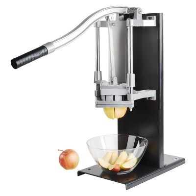 Máquina manual de cortar maçãs com maçã e recipiente em vidro