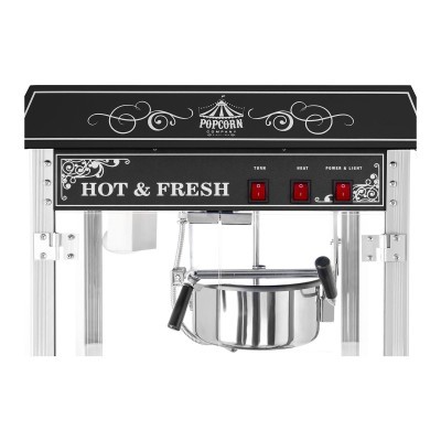 Máquina de pipocas metálica com painel preto e texto branco
