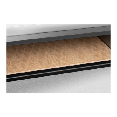 Gaveta aberta com interior em tecido bege texturizado