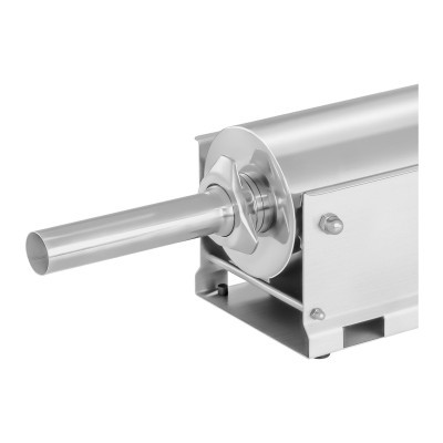 Máquina industrial metálica prateada com haste cilíndrica