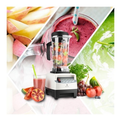 Liquidificador com frutas e copo de sumo