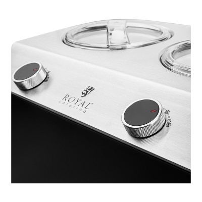 Placa de cozinha eléctrica prateada com botões pretos e tampas transparentes