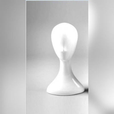 Suporte branco para verniz em forma de cabeça humana