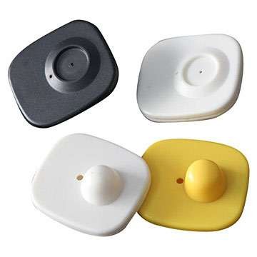 Alarmes antifurto quadrados em plástico preto, branco e amarelo
