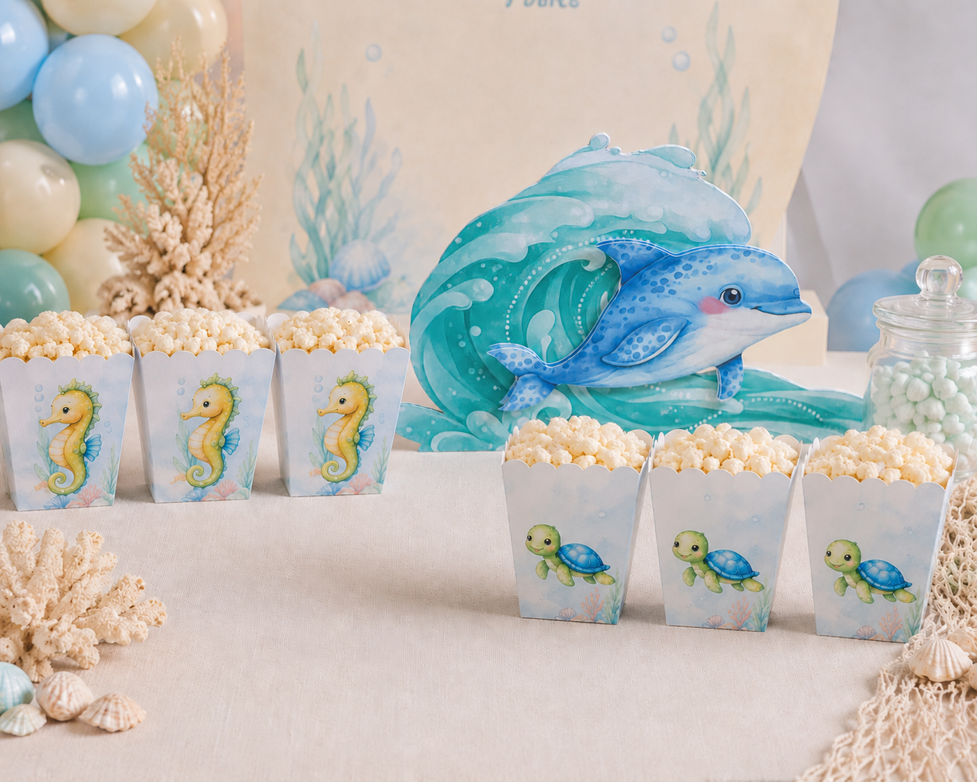 Caixas de pipoca com desenhos de cavalo-marinho e tartaruga em tema marinho