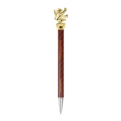 Caneta esferográfica castanha com figura dourada no topo