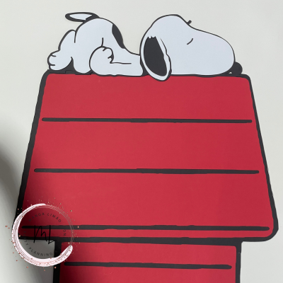 Ilustração de Snoopy deitado numa casota vermelha
