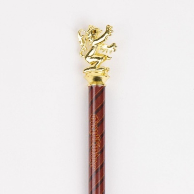 Lápis decorativo com topo de leão dourado