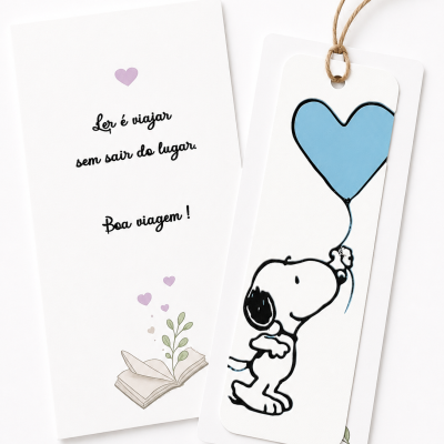 Marca páginas branco com Snoopy e texto em português sobre leitura
