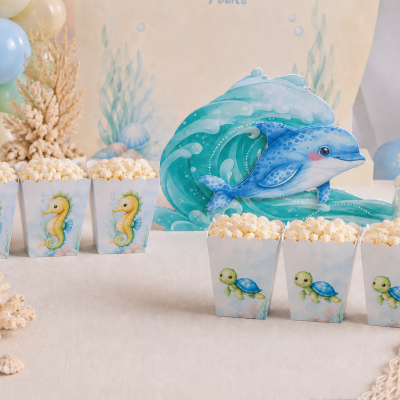 Caixas de pipoca com desenhos de cavalo-marinho e tartaruga em tema marinho