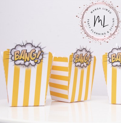 Caixas amarelas às riscas brancas com texto BANG! e nuvem de explosão