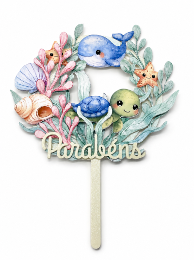 Topper decorativo para bolos com animais marinhos e a palavra Parabéns.