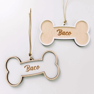 Enfeites decorativos de osso de madeira com o nome Baco