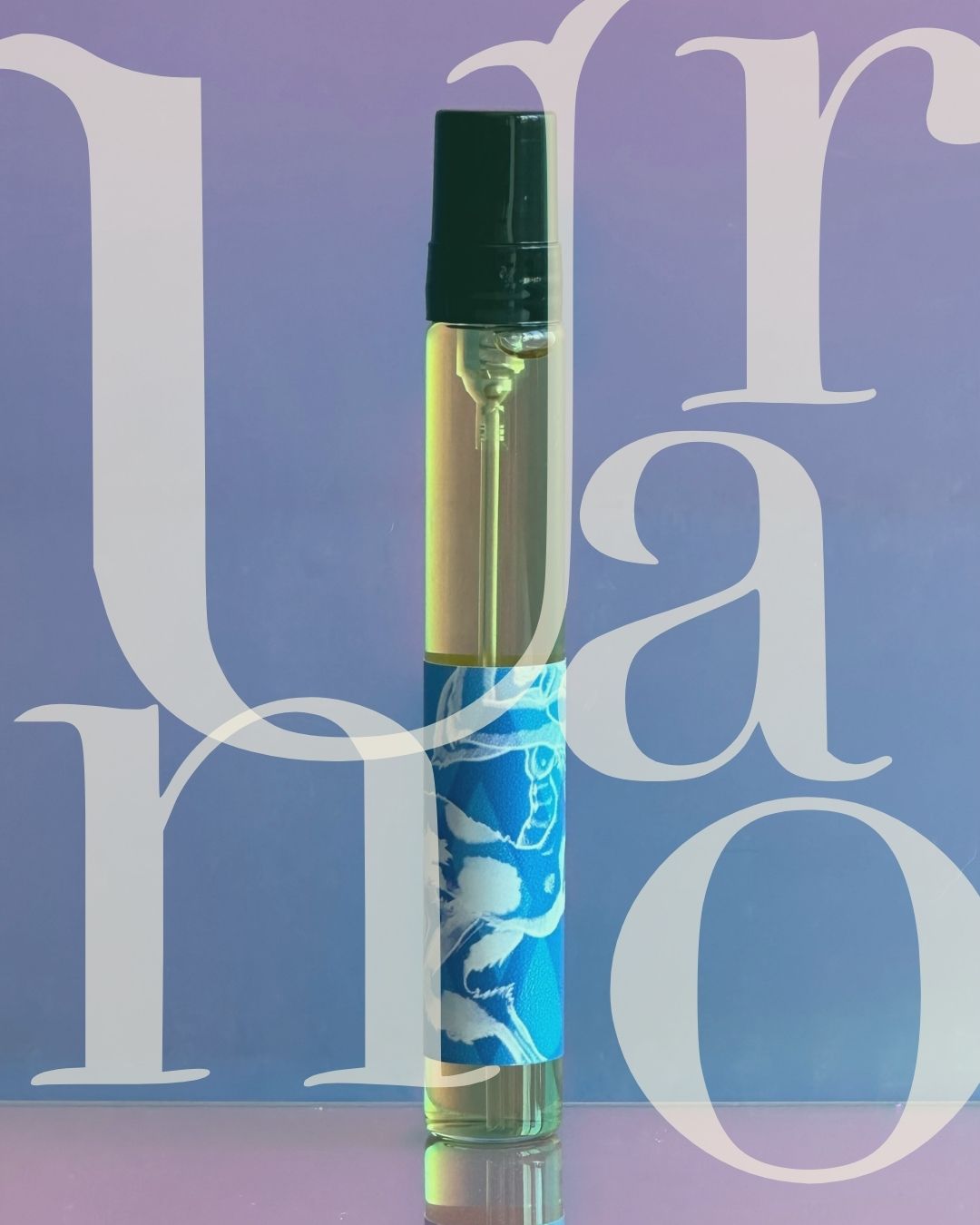 URANO - extrait du ciel - 7,5 ml TRAVEL SIZE refillable Transparent spray bottle with blue floral label and black cap
