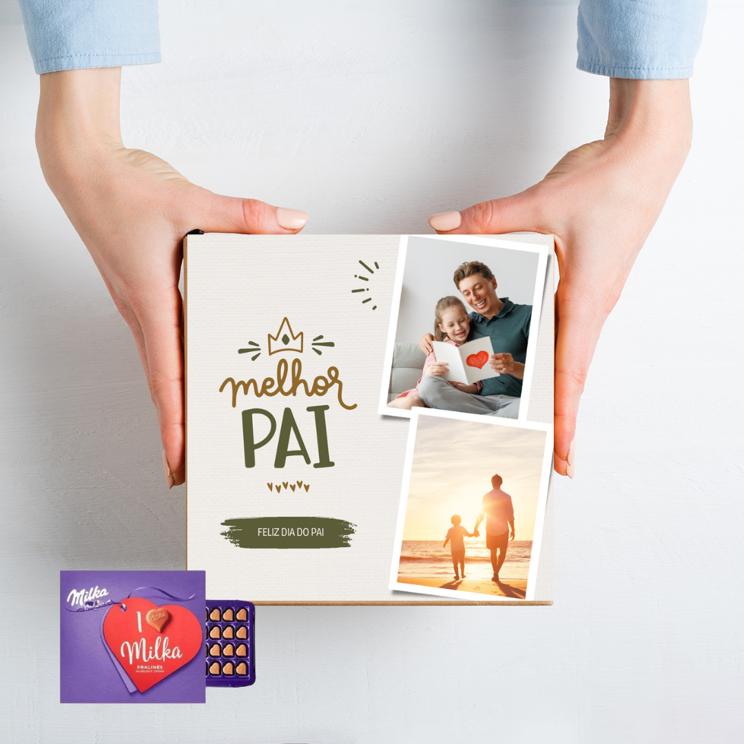 Caixa de presente para o Dia do Pai com fotos e texto, apoiada numa mesa branca com embalagem de chocolates Milka
