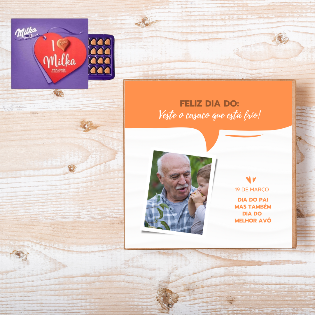 Cartão comemorativo com mensagem e foto de idoso e criança junto de chocolate Milka em formato de coração