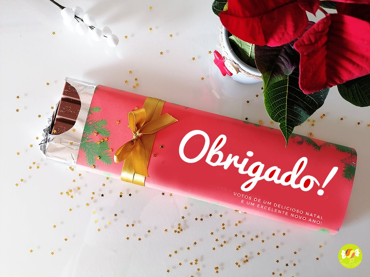 Barra de chocolate com embalagem rosa e texto 'Obrigado!'
