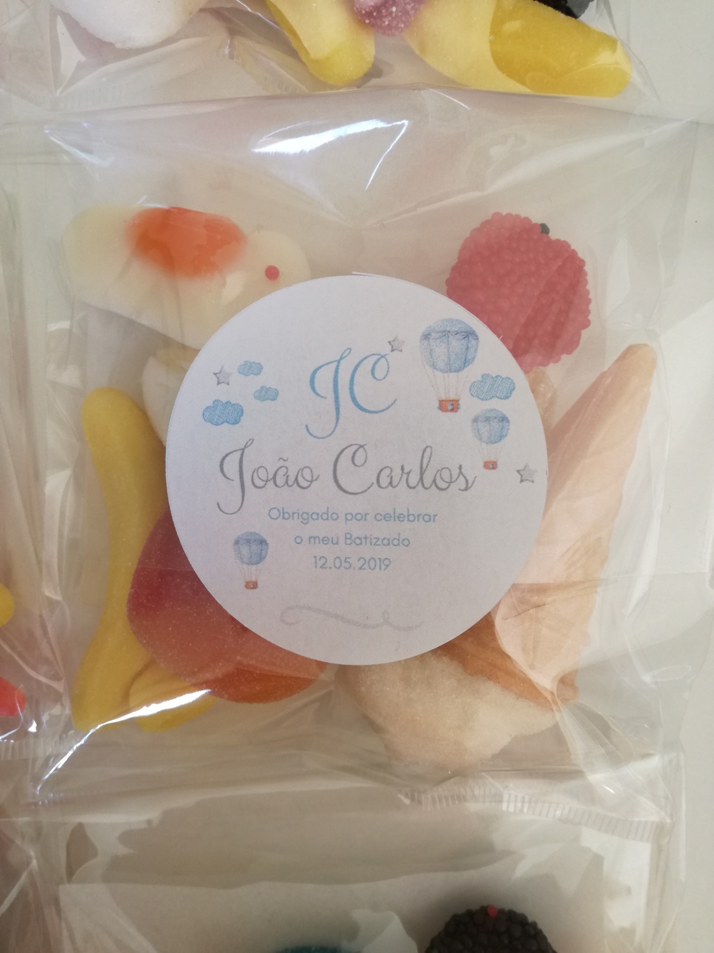 Pack de doces com etiqueta comemorativa do batizado de João Carlos, 12.05.2019