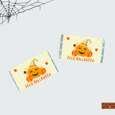 Chocolates embrulhados com tema de Halloween com abóbora, aranha e texto FELIZ HALLOWEEN