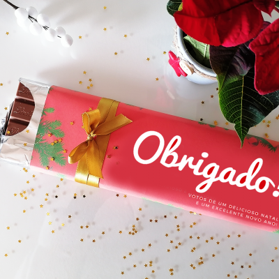 Barra de chocolate com embalagem rosa e texto 'Obrigado!'