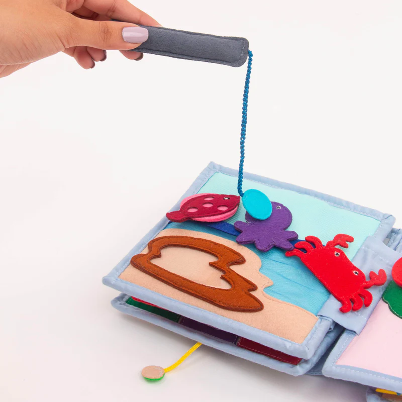 Arco Íris - Mini Livro Sensorial de 6 Páginas Livro de pano interativo com figuras marinhas e varinha magnética