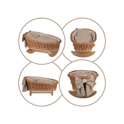 Berço de vime castanho com base de madeira e almofada estampada