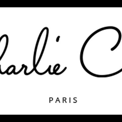 Logotipo Charlie Crane com figura de pássaro e texto PARIS