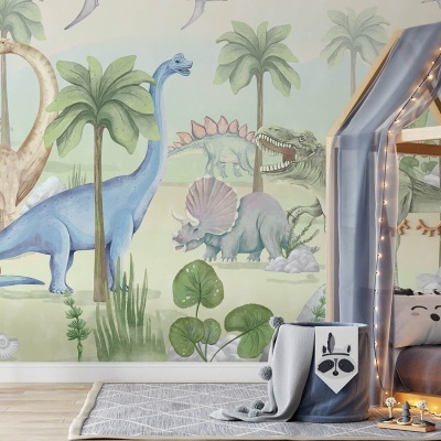 Quarto infantil com papel pintado de dinossauros, tenda cinza com luzes e manta decorativa
