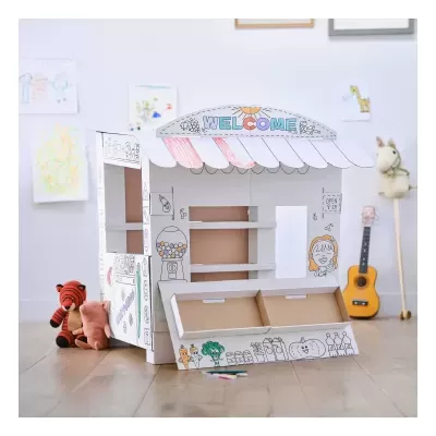 Casinha de brincar infantil de cartão branco com desenhos para colorir e texto Welcome ao topo.