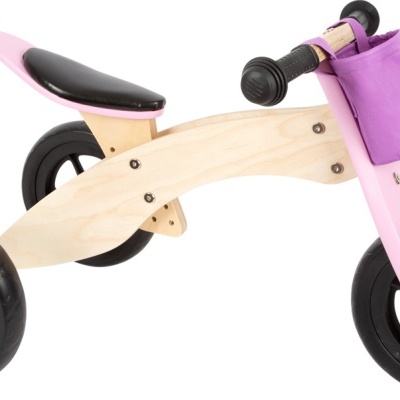 Triciclo infantil de madeira com rodas pretas e detalhes rosa e roxo