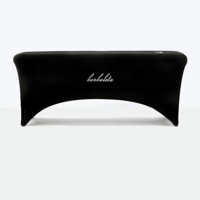 Mesa preta com capa e texto 'borboleta' na frente