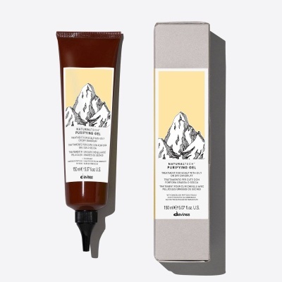 Frasco e caixa de gel purificante Davines com desenho de montanhas e rótulo amarelo