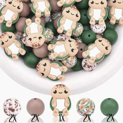 Conjunto de contas de silicone coloridas e em forma de tartaruga numa taça branca