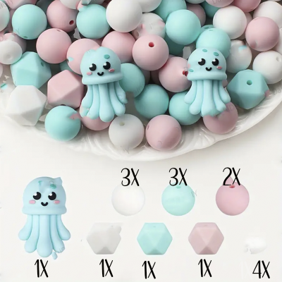 Conjunto de contas e brinquedos de silicone coloridos em tons pastel com polvos azuis e vários tipos de contas redondas e geométricas