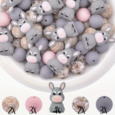Conjunto de contas de silicone coloridas e com figura de burro num recipiente branco