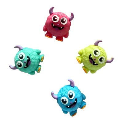 Brinquedos monstros coloridos com olhos grandes e chifres