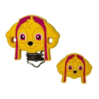 Dois acessórios infantis amarelos e cor-de-rosa em forma de cabeça de cão com fecho metálico